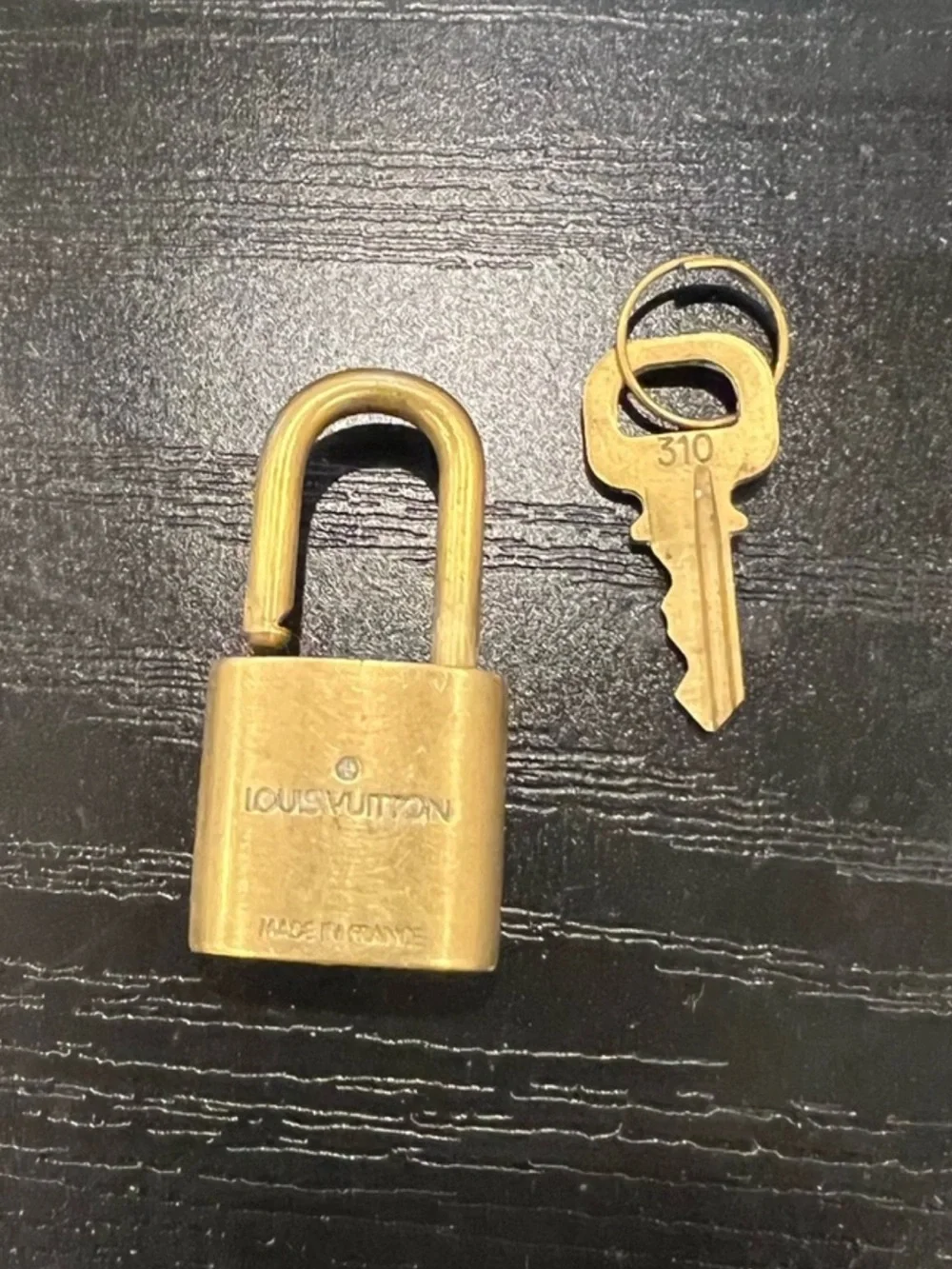 Louis Vuitton gold tone
